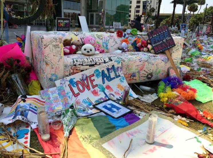 Staff with the Orange County Regional History Center expect to collect thousands of items as part of memorials across downtown Orlando. Photo: Renata Sago.