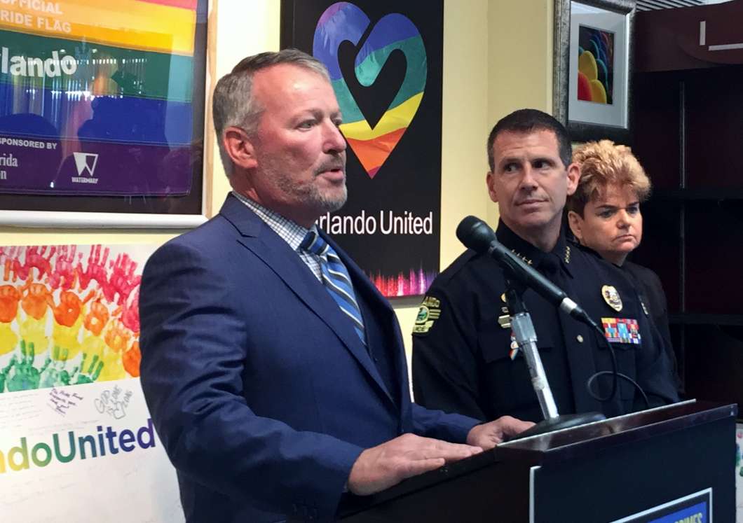 Photo, L to R: Orlando Mayor Buddy Dyer, Orlando Police Department Chief John Mina, District 4 Commissioner Patti Sheehan.