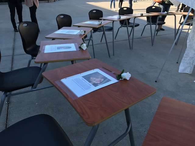 17 desks, one for each victim, at the Wekiva High memorial. Photo: Danielle Prieur