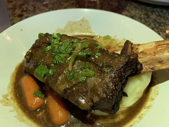 For my entree I selected that Short Rib Carbonnade, described as a “hearty Belgian dish” with a large braised rib with a gravy infused with beer, mustard and gingerbread. Photo: Scott Joseph