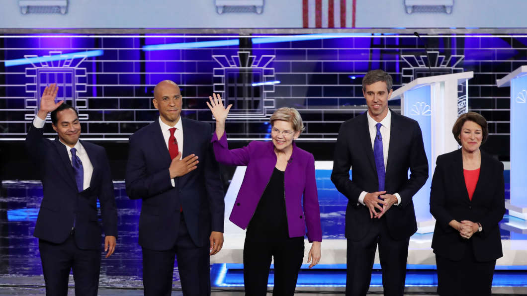 On Wednesday in Miami, Democratic presidential candidates take the stage during the first night of the Democratic presidential debate. From left: former Housing and Urban Development Secretary Julián Castro, New Jersey Sen. Cory Booker, Massachusetts Sen. Elizabeth Warren, former Texas Rep. Beto O'Rourke and Sen. Amy Klobuchar of Minnesota.