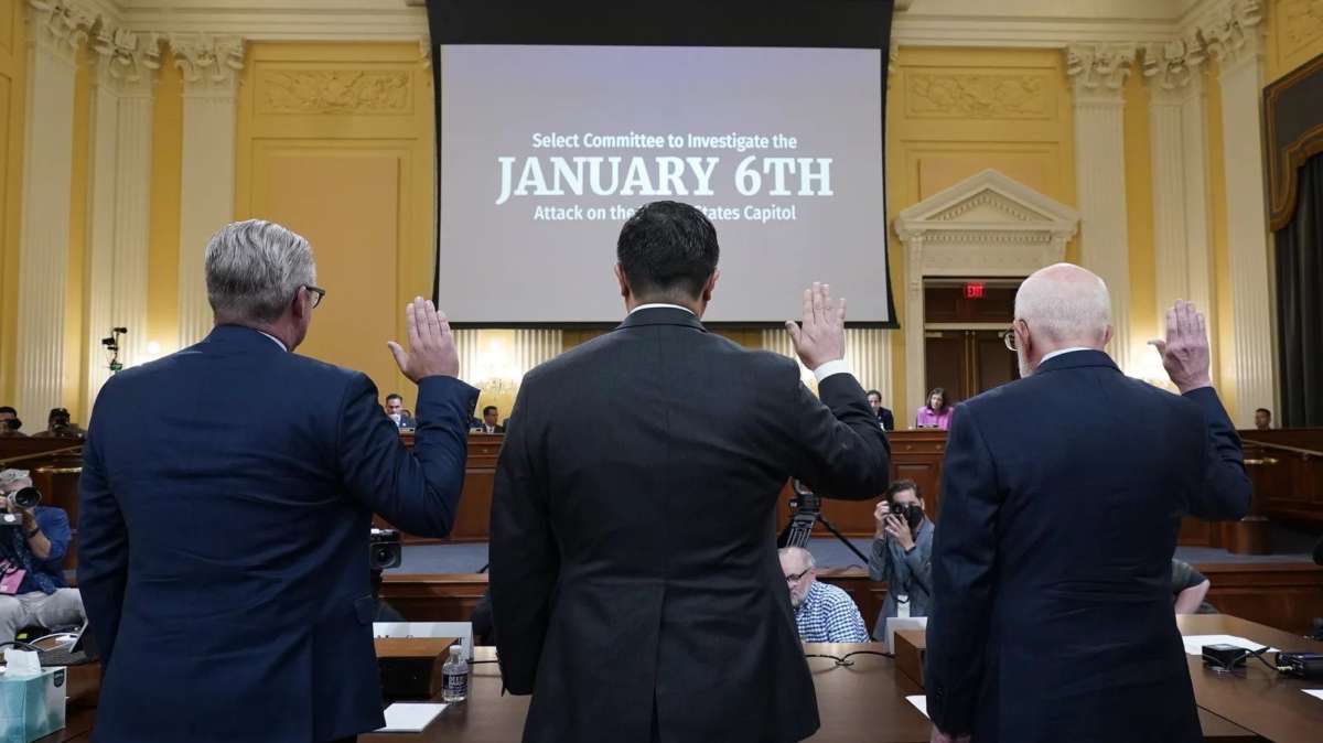 Witnesses swear in before a House select committee investigating the Jan. 6 attack on the U.S. Capitol hearing on Monday. J. Scott Applewhite/AP
